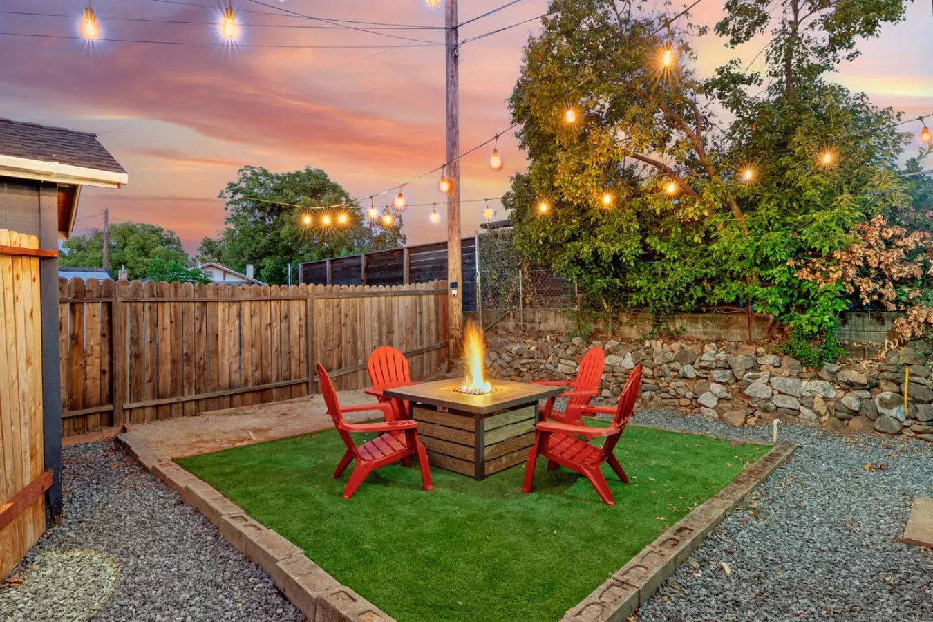 Firepit seating under string lights